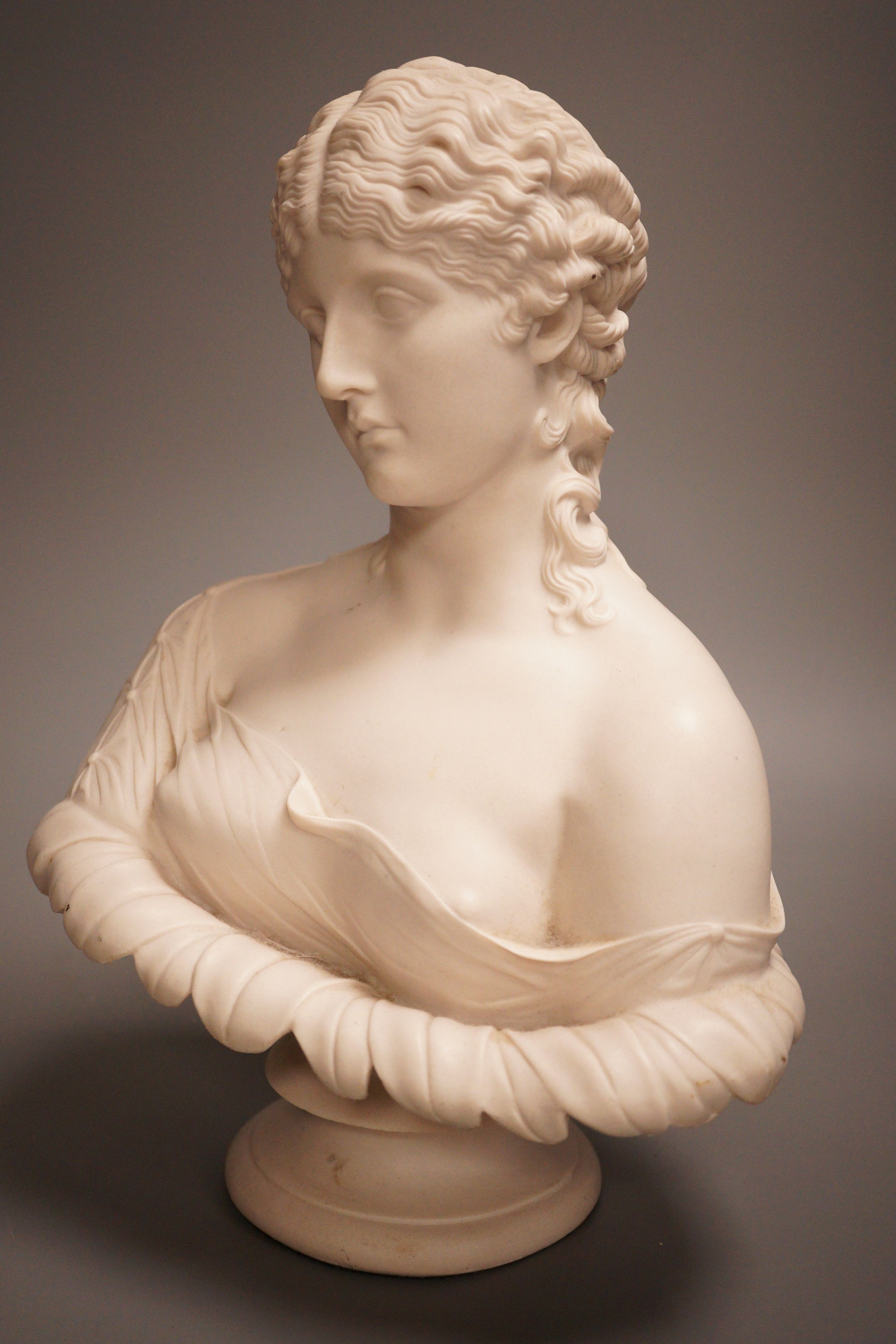 A reconstituted marble bust of Clytie, 32cm